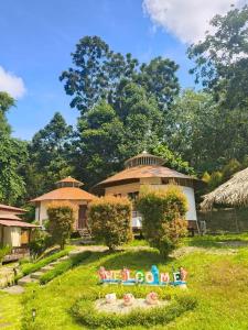 a house with a garden with toys in the yard at Libong haven in Ko Kwang