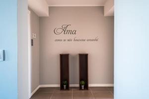 a lobby with two elevators in a building at What else guest house in Fátima