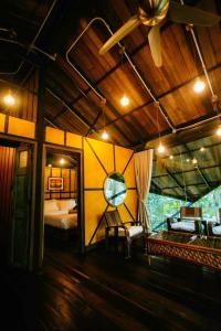 a room with a bedroom with a bed and a ceiling at Voraman B-One in Chiang Mai +169 photos