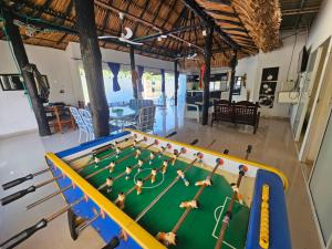 a view of a pool table in a room at PLAYABRISAMAR in San Antero