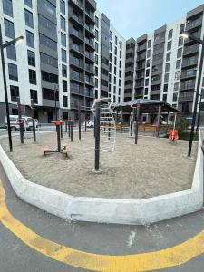a playground in the middle of a city at Silk Road Retreat City Center in Bukhara