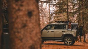 a white jeep parked on a dirt road in the woods at Casa della Capra in Mergozzo +128 photos