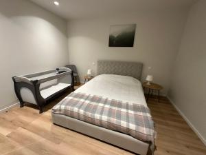 a bedroom with a bed and two side tables at Varandas do Gerês in Geres +22 photos