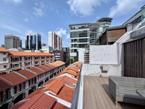 a view of a city from the roof of a building at Aura Hotel Purvis in Singapore