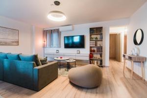 a living room with a couch and a table at Deli Home in Kastoria
