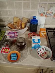 a kitchen counter with some food on it at Al Nido Del Passero 1 in Greccio +22 photos