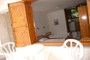 Postel nebo postele na pokoji v ubytování Kipos Hotel