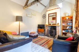 a living room with a couch and a fireplace at 1 Bed in Trimingham oc-h29803 in Trimingham