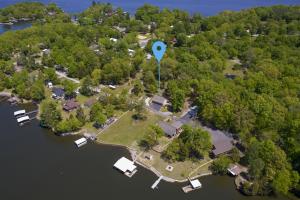 an aerial view of an island with a blue marker at Lakefront Suite Dock, No-Wake Cove & Firepit in Marion +37 photos