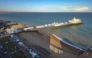 an aerial view of a pier in the ocean at StayPoint in Eastbourne