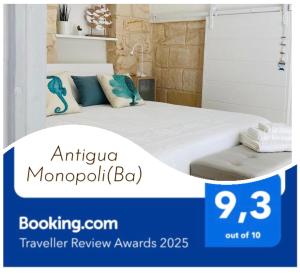 a poster of a bedroom with a bed in a room at Antigua in Monopoli