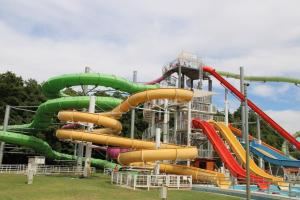 a water park with a water slide at Karos Kristály Apartman in Zalakaros