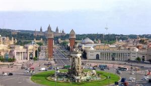 a city with a fountain in the middle of a street at BARCELONA AIRPORT Mi COLIBRÍ in El Prat de Llobregat +12 photos