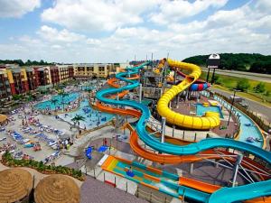 a water park with a bunch of water slides at HotTub|Sauna|Theater|BBQ|Firepit|Game|Pool in Long Pond