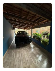 a car parked inside of a garage at Casa da Vila de São Jorge in Sao Jorge