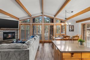 a living room with a couch and a fireplace at 4 Jay Lane in Sunriver