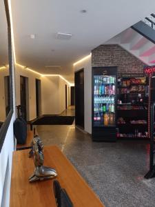 a drink station with a soda machine in a room at Hotel Connect Ibira Servidor Park in São Paulo +88 photos