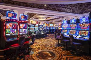 a casino with many slot machines in a room at Nobu Hotel Atlantic City - A Caesars Rewards Destination in Atlantic City