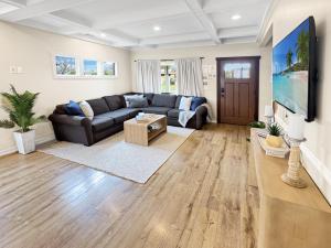 a living room with a couch and a table at F-60 Disney Dream Craftsman in Anaheim
