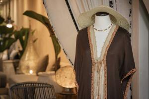 a dress on a mannequin in a room at Coral Breeze Retreat in Balcheil +121 photos