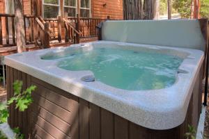 a jacuzziificialificialificialificialificialificialificialificialificialificialificial at Rivercrest Lodge with Hot Tub-Pool Table-Firepit in North Wawona
