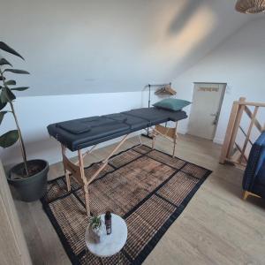 a room with a bed in the corner of a room at LoveRoom La Parenthèse Secrète in Lampaul-Plouarzel +16 photos