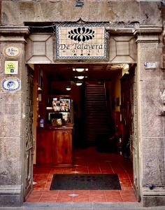 an entrance to a store with a sign on it at Hotel de Talavera in Puebla