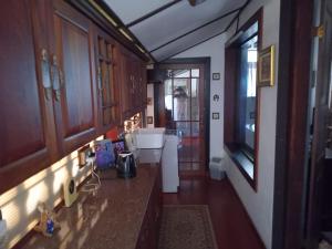 a bathroom with a sink and a toilet at The Garden Villa in Matara