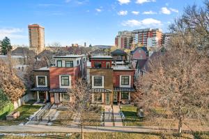 an aerial view of a house in a city at Rooftop Retreat with Workspace and BBQ in Denver