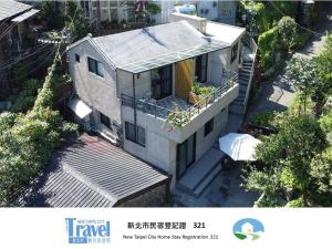 an overhead view of a house with a balcony at Lucky House B&B in Jiufen