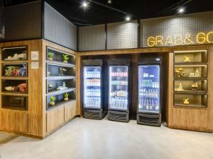 a store with four refrigerators in a room at ibis Rio de Janeiro Nova America in Rio de Janeiro