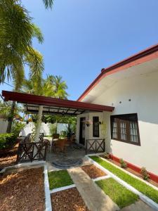 a view of a house with a patio at Villa Octopus in Maggona West
