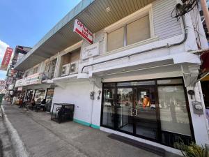 a store front of a building on a street at Optimun Inn in Davao City