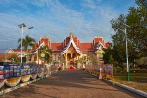 a large building with a red roof at JI Hotel Vientiane Mekong Riverside in Vientiane