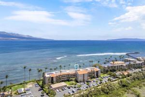 an aerial view of a resort next to the ocean at Lauloa 106 in Wailuku