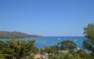 a view of a bay with boats in the water at Villa Piscine Privative in Saint-Florent +12 photos