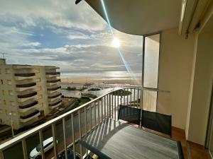 a balcony of a building with a view of the ocean at T3 Rénové vue mer in Saint-Jean-de-Monts