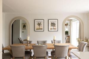 a dining room with a table and chairs at The Nook by The Butler Collection in Petworth