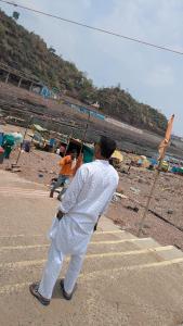 a man walking up some steps on a beach at Bela bhavan in Kānpur