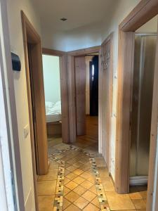 a hallway with a floor that is being remodeled at Chalet Rin da Pemont in Livigno +83 photos