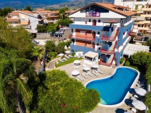 an aerial view of a hotel with a swimming pool at Hotel Alexander in Giardini Naxos