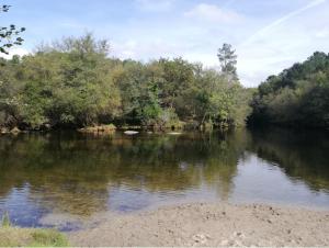 a river with trees on the side of it at Casa Salvia in Castelanes