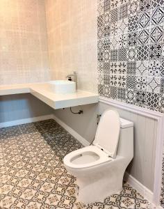 a bathroom with a toilet and a sink at Koh Kood BED's in Ko Kood +91 photos