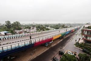 a train is parked at a train station at Hotel Leaf Inn in Lucknow