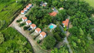 an aerial view of a house in the forest at Pousada Desfiladeiro da Serra in Serra Negra