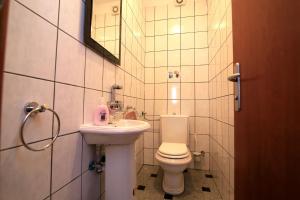 Koupelna v ubytování Apartments Šulekić
