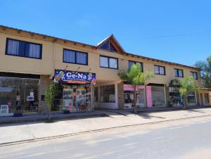 a building on the side of a street at Rdsa Paso in Paso de la Patria