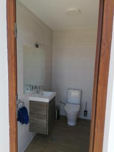 a bathroom with a sink and a toilet at Casa Abuela Serapia in Tuineje