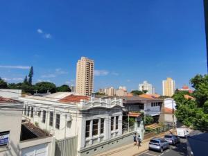 a view of the city from the roof of a building at Hotel XV in Piracicaba