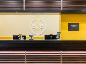 a bar in a fast food restaurant at B&B HOTEL Fabriano Janus in Fabriano